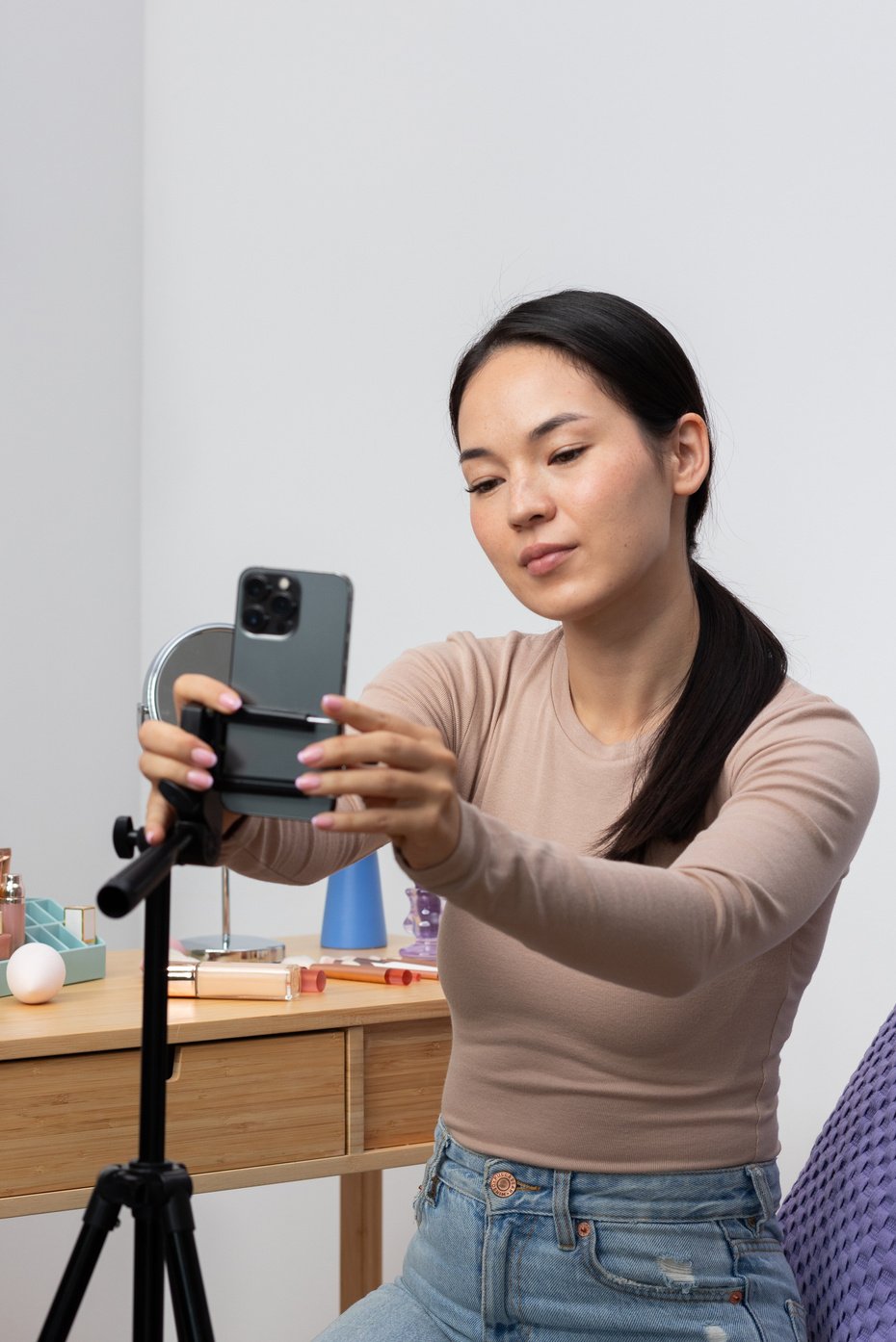 Woman Setting Her Smartphone for Video Recording