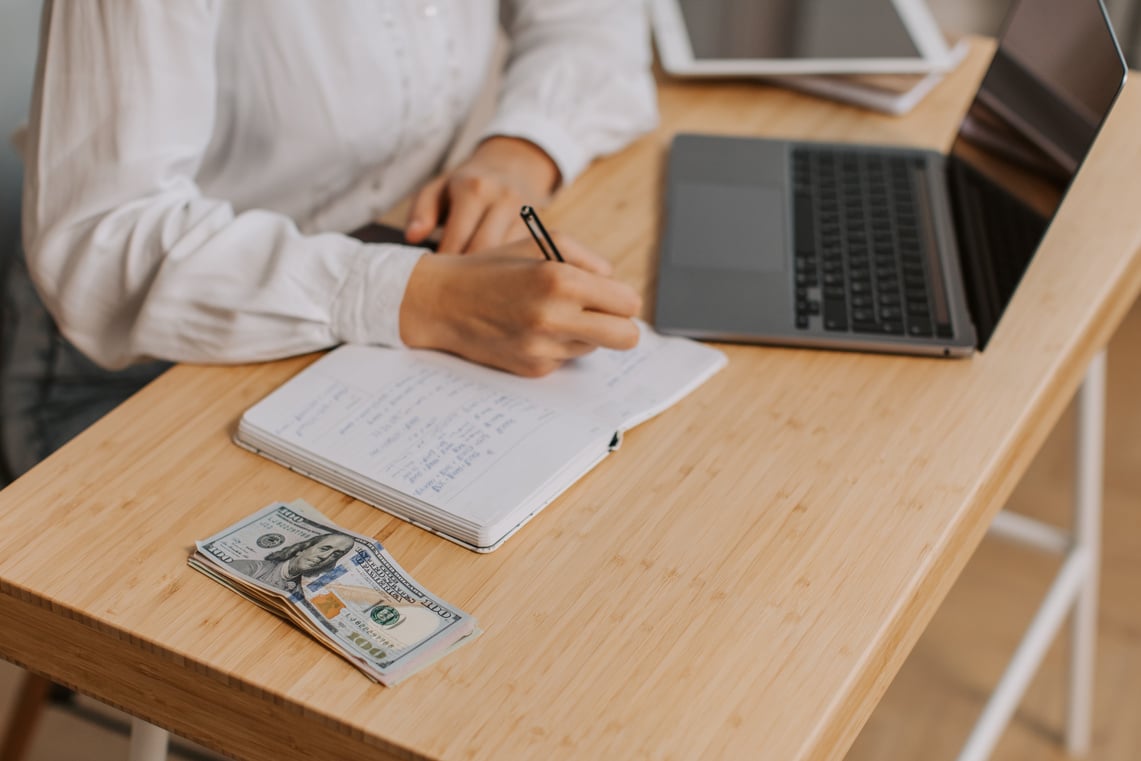 Woman Budgeting Her Money